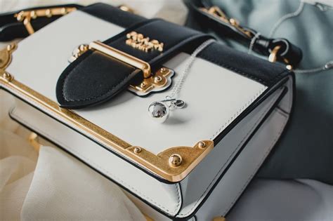 do prada repair bags